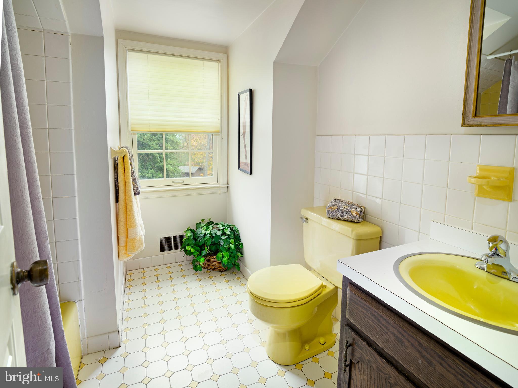 1345 Valley Road Villanova, PA 19085 - Photo 57 of 60 a bathroom with a sink a toilet and a mirror