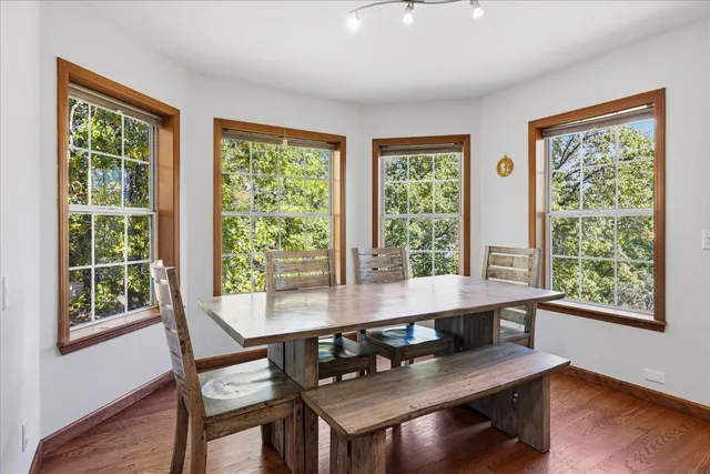 a view of living room with furniture and floor to ceiling window