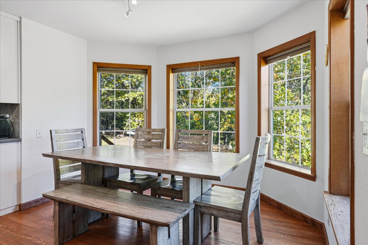 59484 Cascadel Road North Fork, CA 93643 - Photo 21 of 95 a dining room with furniture and wooden floor
