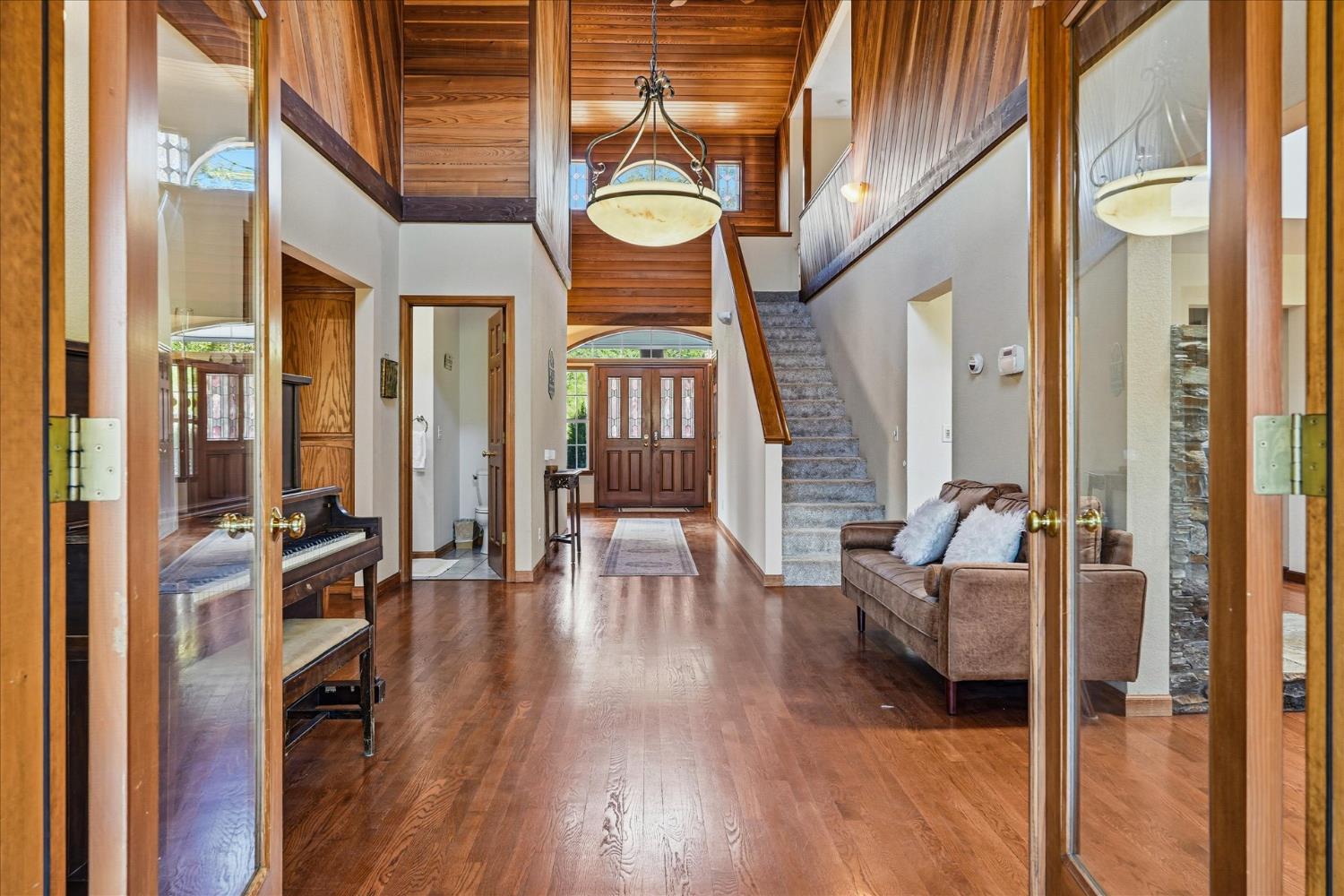 59484 Cascadel Road North Fork, CA 93643 - Photo 37 of 95 a view of living room with furniture and floor to ceiling window