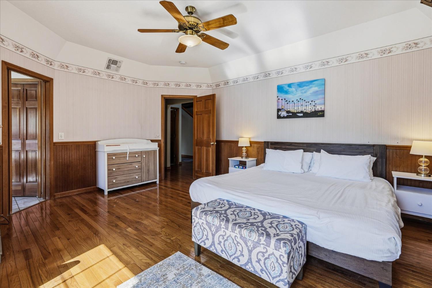 59484 Cascadel Road North Fork, CA 93643 - Photo 40 of 95 a bedroom with a bed dresser and a walk in closet