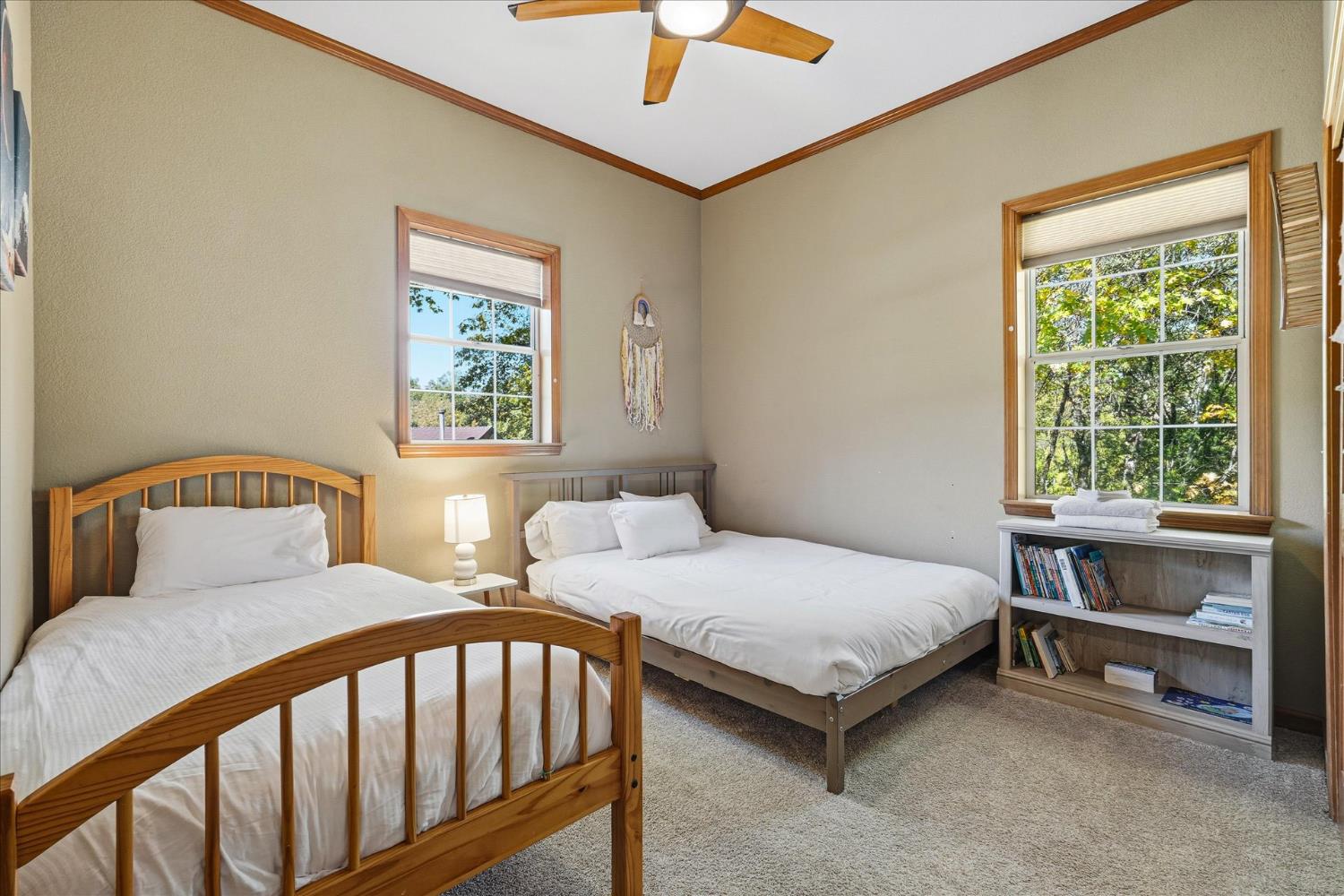 59484 Cascadel Road North Fork, CA 93643 - Photo 49 of 95 a bedroom with a bed and a table in it