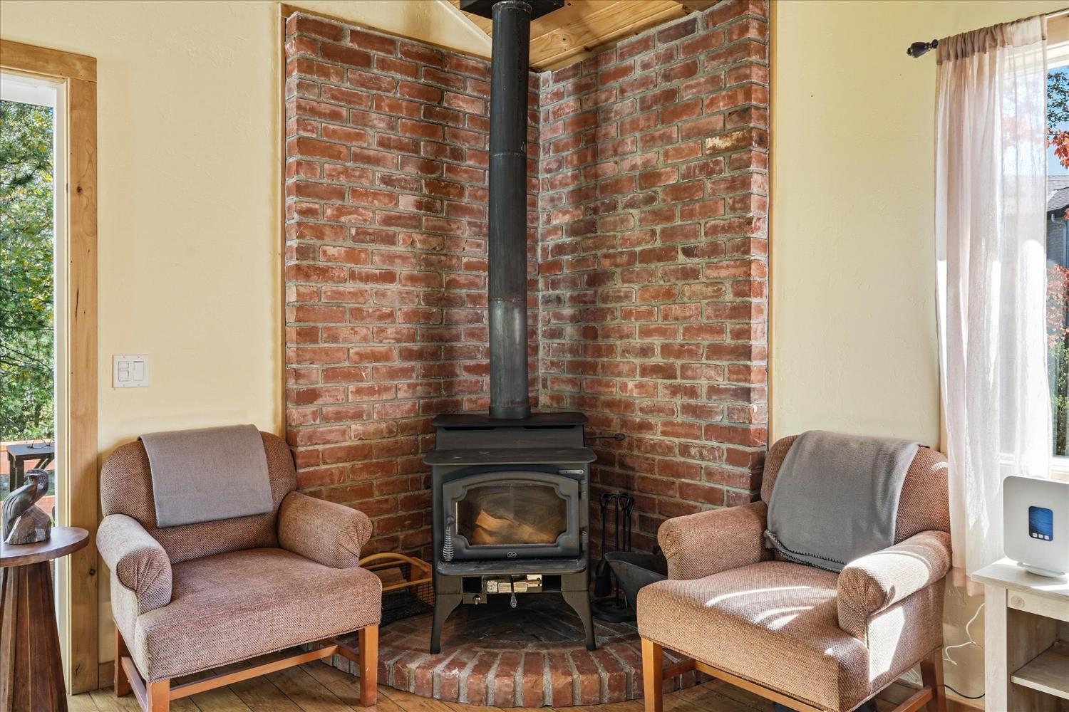 59484 Cascadel Road North Fork, CA 93643 - Photo 65 of 95 a living room with furniture and a fireplace