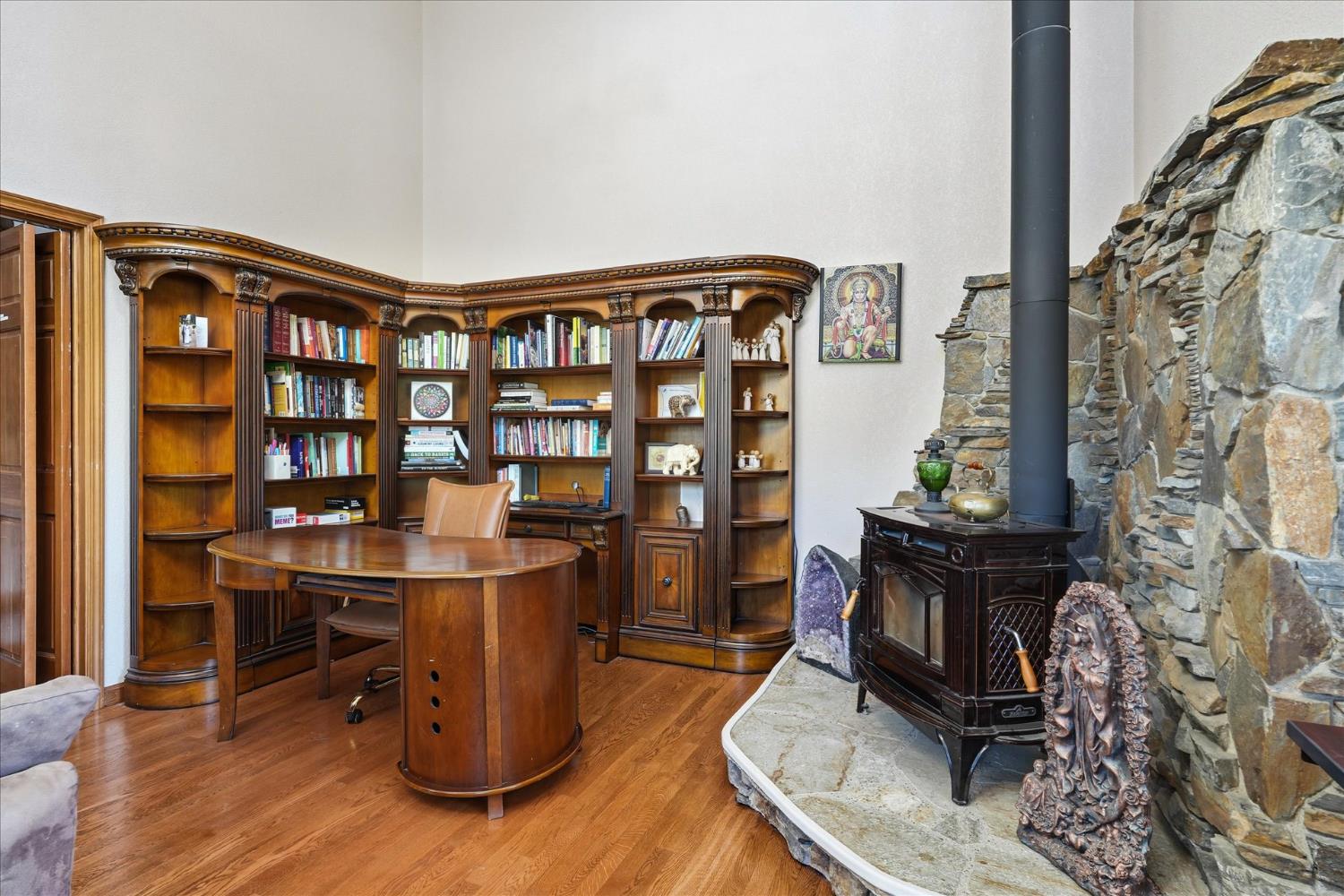 59484 Cascadel Road North Fork, CA 93643 - Photo 9 of 95 a living room with furniture a bookshelf and a wooden floor