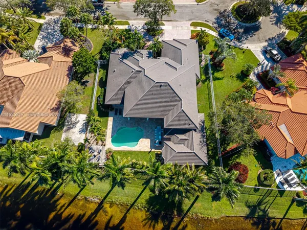 a front view of house with yard outdoor seating and barbeque oven