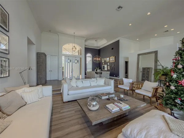 a spacious bedroom with a large bed and a couch