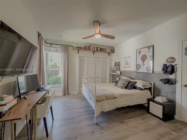 a utility room with sink dryer and washer