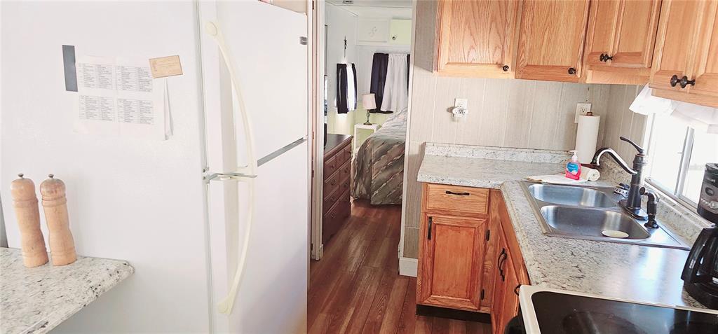 10315 Cortez Road West, Unit 714 Bradenton, FL 34210 - Photo 16 of 26 a view of a kitchen with appliances and cabinets