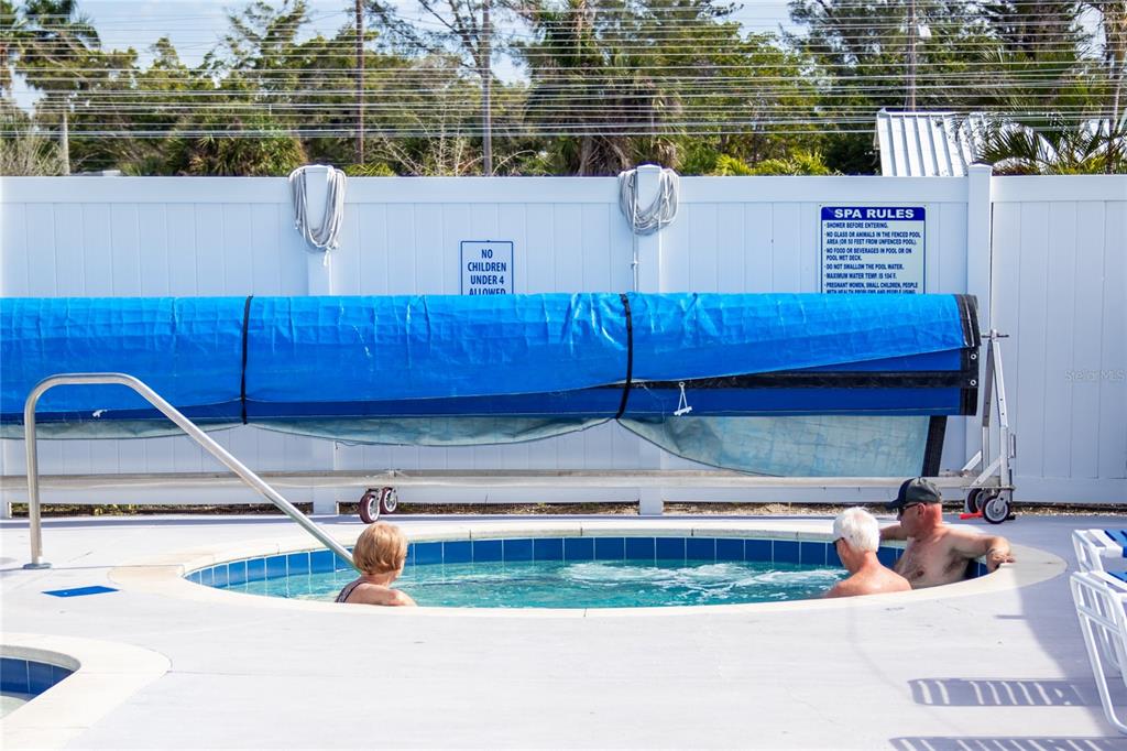 10315 Cortez Road West, Unit 714 Bradenton, FL 34210 - Photo 22 of 26 a view of a kitchen with a sink and microwave