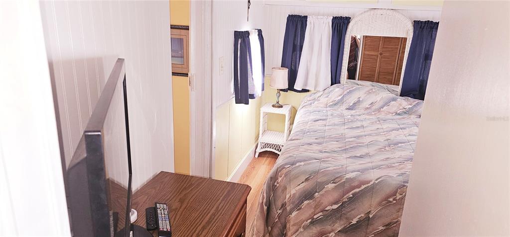 10315 Cortez Road West, Unit 714 Bradenton, FL 34210 - Photo 8 of 26 a bed room with a bed and a window