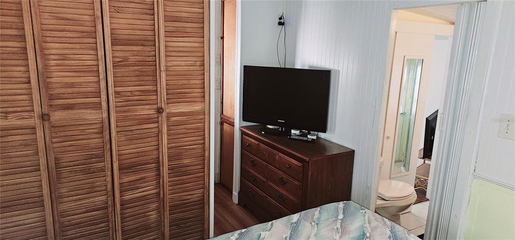 10315 Cortez Road West, Unit 714 Bradenton, FL 34210 - Photo 9 of 26 a bathroom with a toilet a sink and mirror