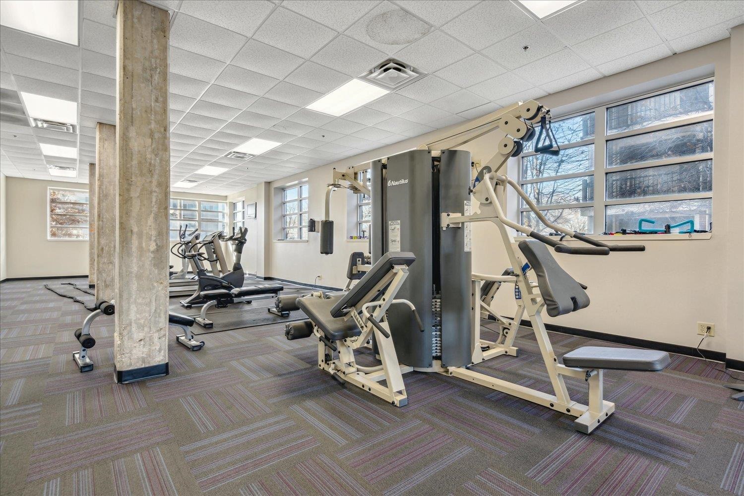 648 Riverside Drive, Unit 411 Memphis, TN 38103 - Photo 22 of 32 a view of a room with gym equipment