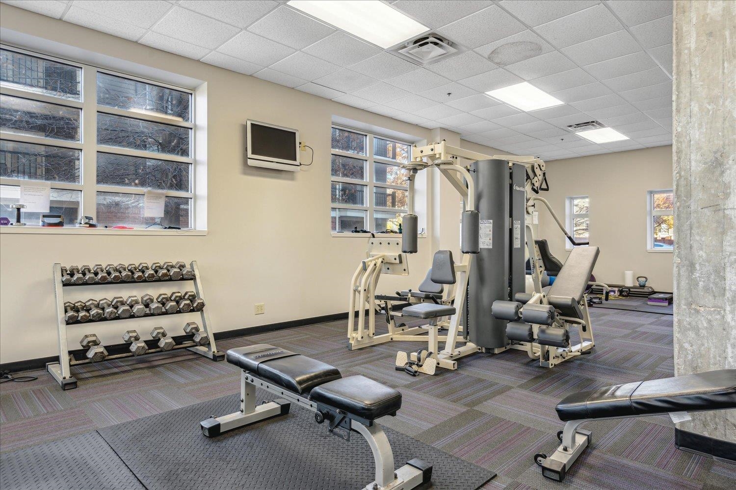 648 Riverside Drive, Unit 411 Memphis, TN 38103 - Photo 23 of 32 a view of a room with gym equipment