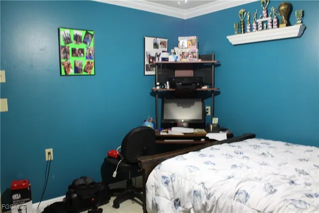 a view of a hallway with wooden floor and cabinet