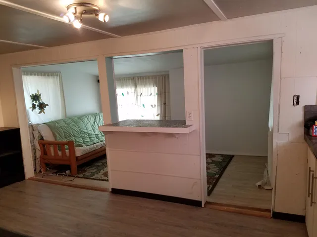 a living room with furniture and a table