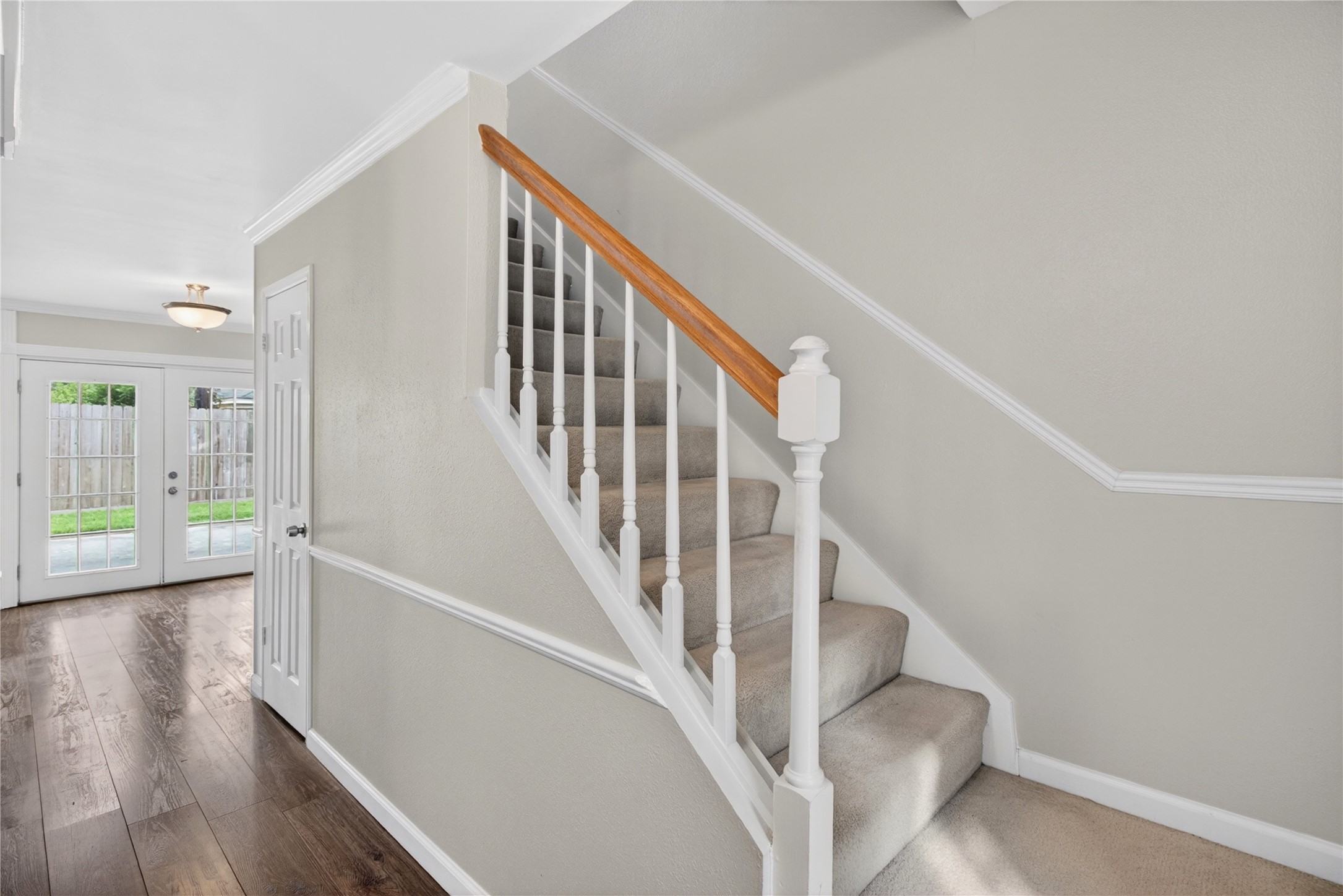 20214 Woodsboro Court Spring, TX 77388 - Photo 27 of 50 Entry Hall & Stairs to Second Floor! Door to Under Stair Closet! Recently Painted Interior! Luxury Vinyl Plank throughout 1st Floor!