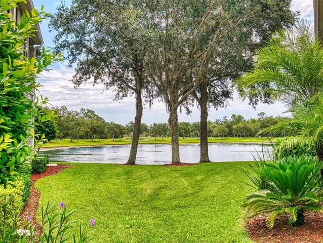 a view of swimming pool with a patio