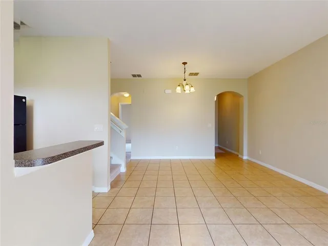 a view of a livingroom with a staircase
