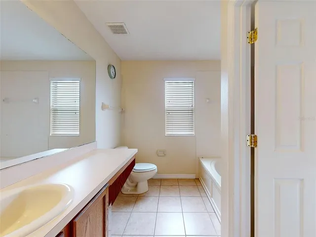 a bathroom with a sink and a bathtub