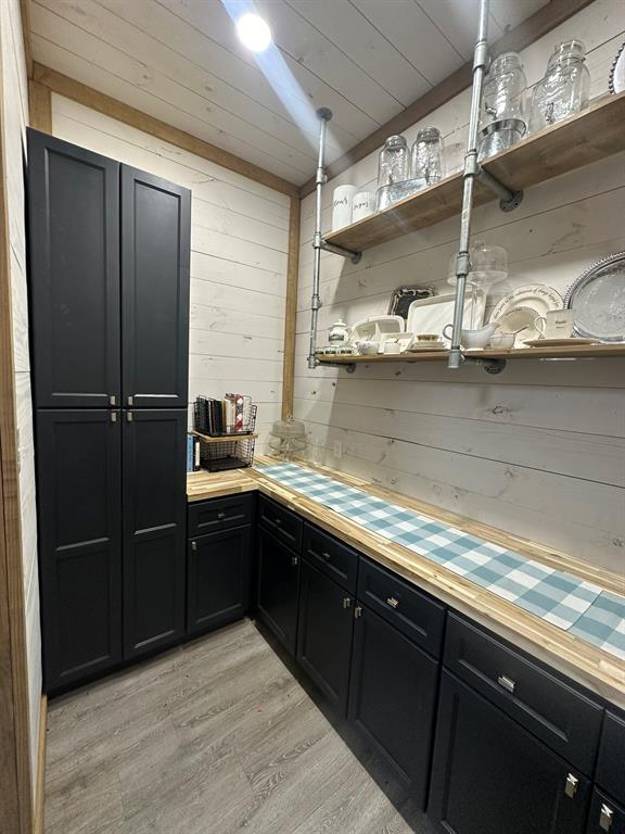 511 John Davis Road Italy, TX 76651 - Photo 18 of 40 a kitchen with a sink and cabinets