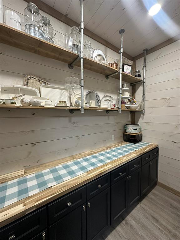 511 John Davis Road Italy, TX 76651 - Photo 19 of 40 a kitchen with a sink and cabinets