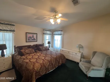 a bedroom with a bed and furniture