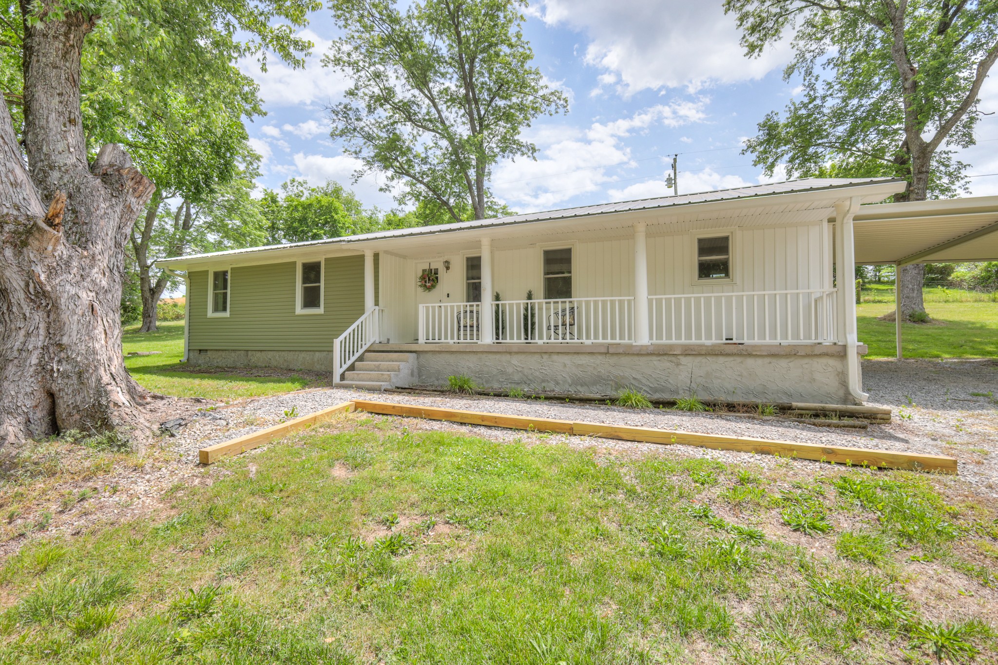 11914 Hogwood Road Milton, TN 37118 - Photo 2 of 44 front view of a house with a yard