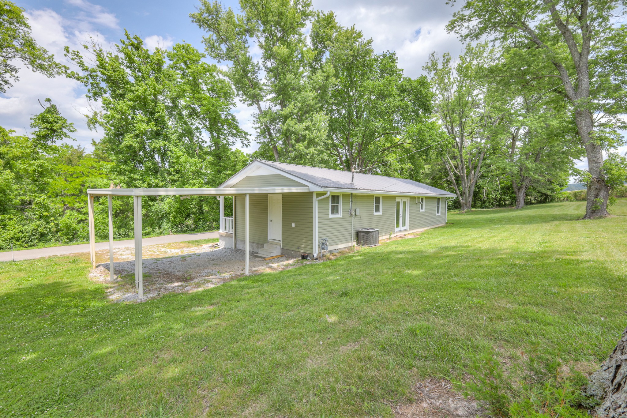 11914 Hogwood Road Milton, TN 37118 - Photo 32 of 44 a view of house with a backyard