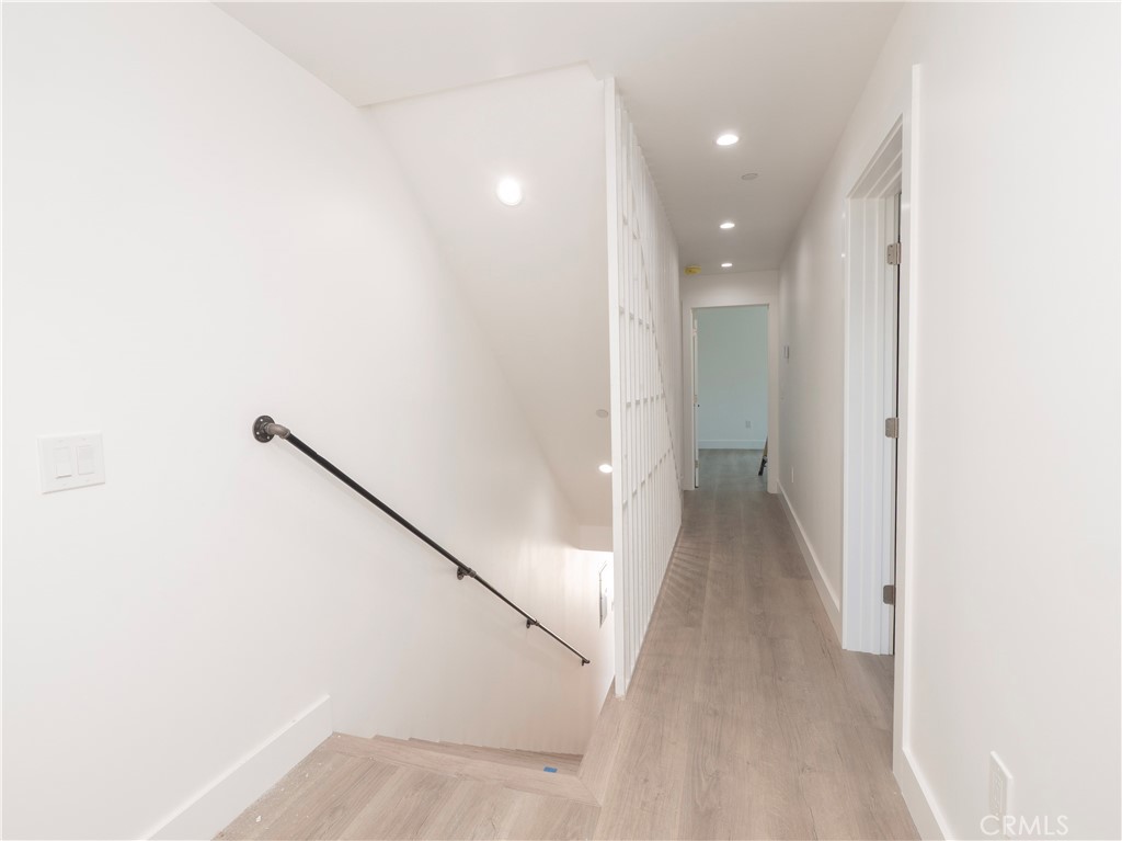1571 Ricardo Street Los Angeles, CA 90033 - Photo 8 of 29 a view of a hallway with a white walls