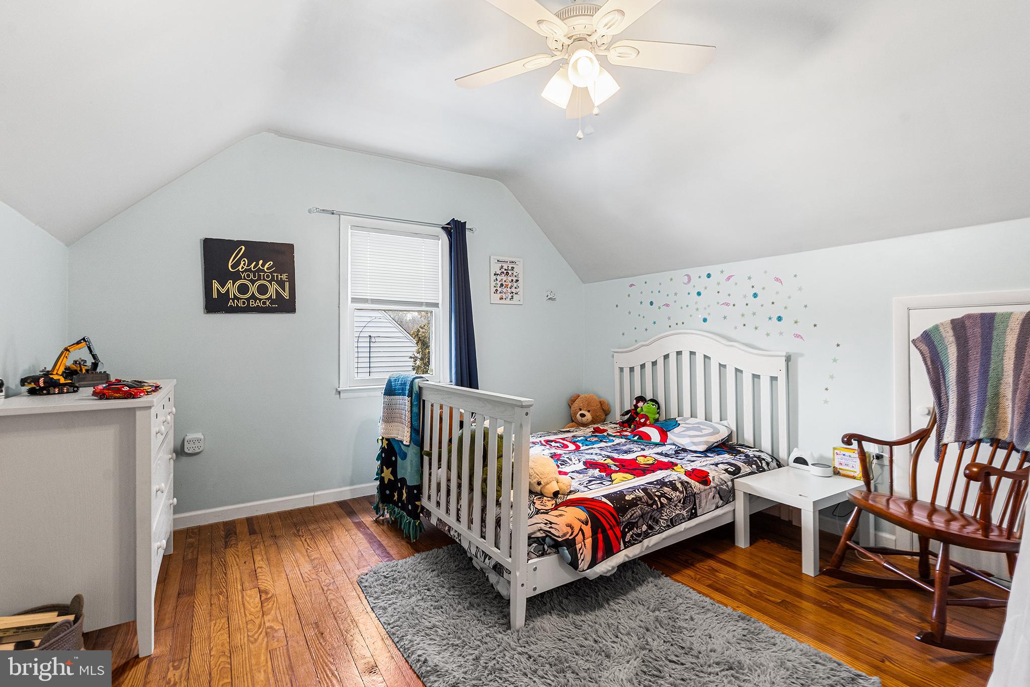 225 McClellan Street Reading, PA 19611 - Photo 17 of 25 a bedroom with furniture and a wooden floor