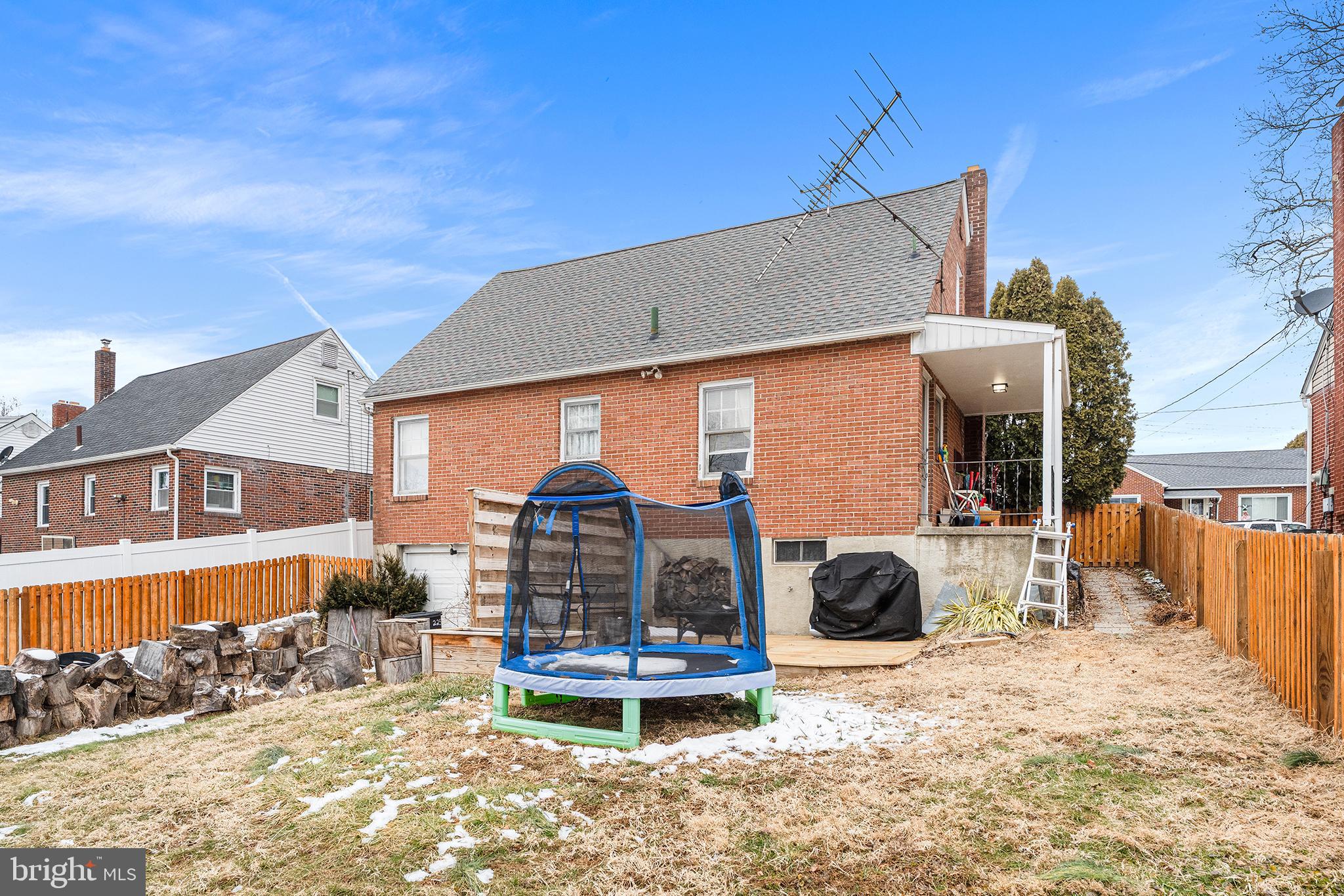 225 McClellan Street Reading, PA 19611 - Photo 23 of 25 a front view of a house with a yard