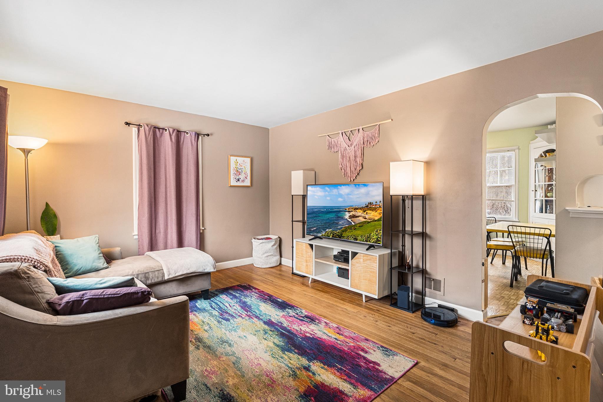 225 McClellan Street Reading, PA 19611 - Photo 3 of 25 a living room with furniture and a flat screen tv