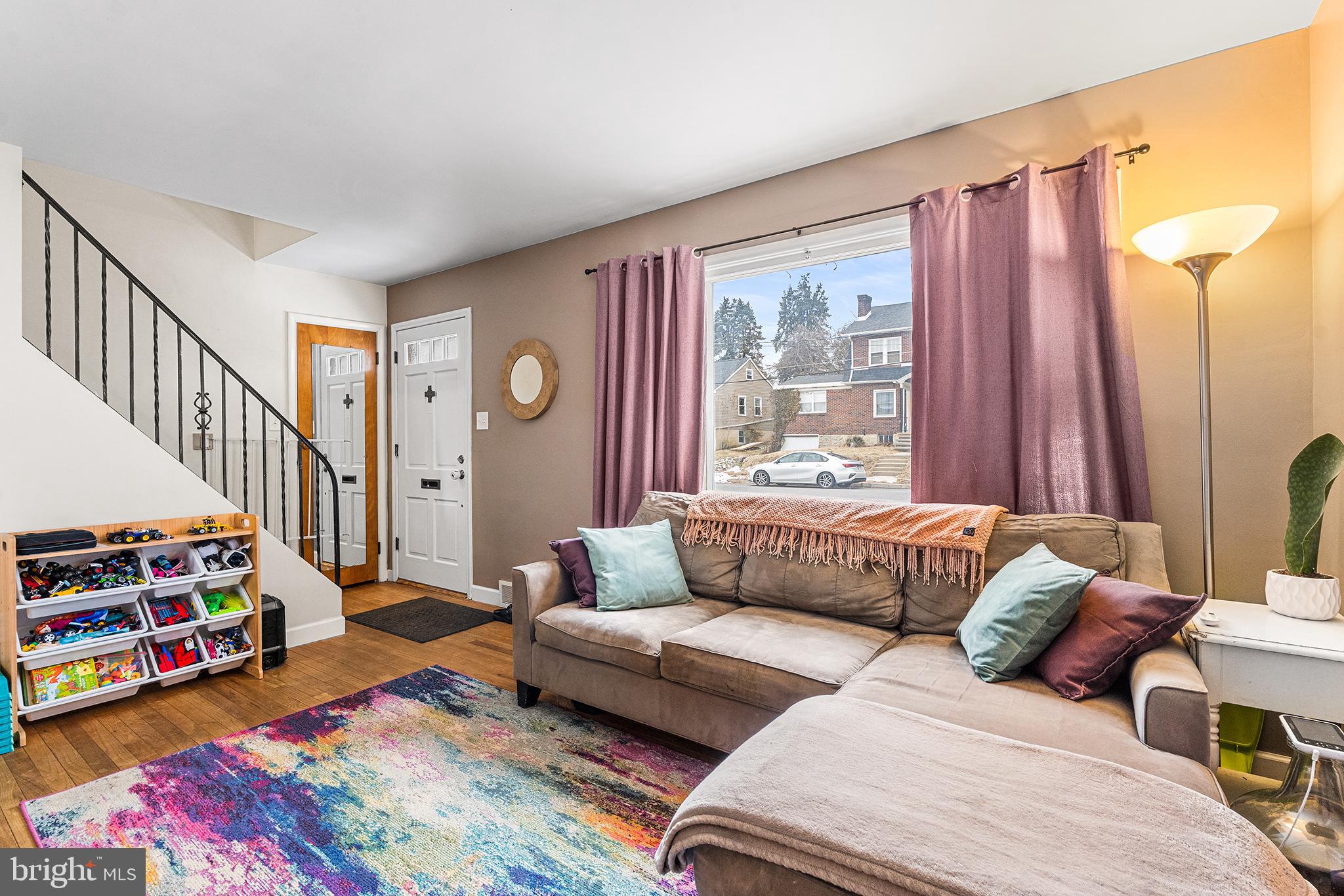 225 McClellan Street Reading, PA 19611 - Photo 4 of 25 a living room with furniture and a rug