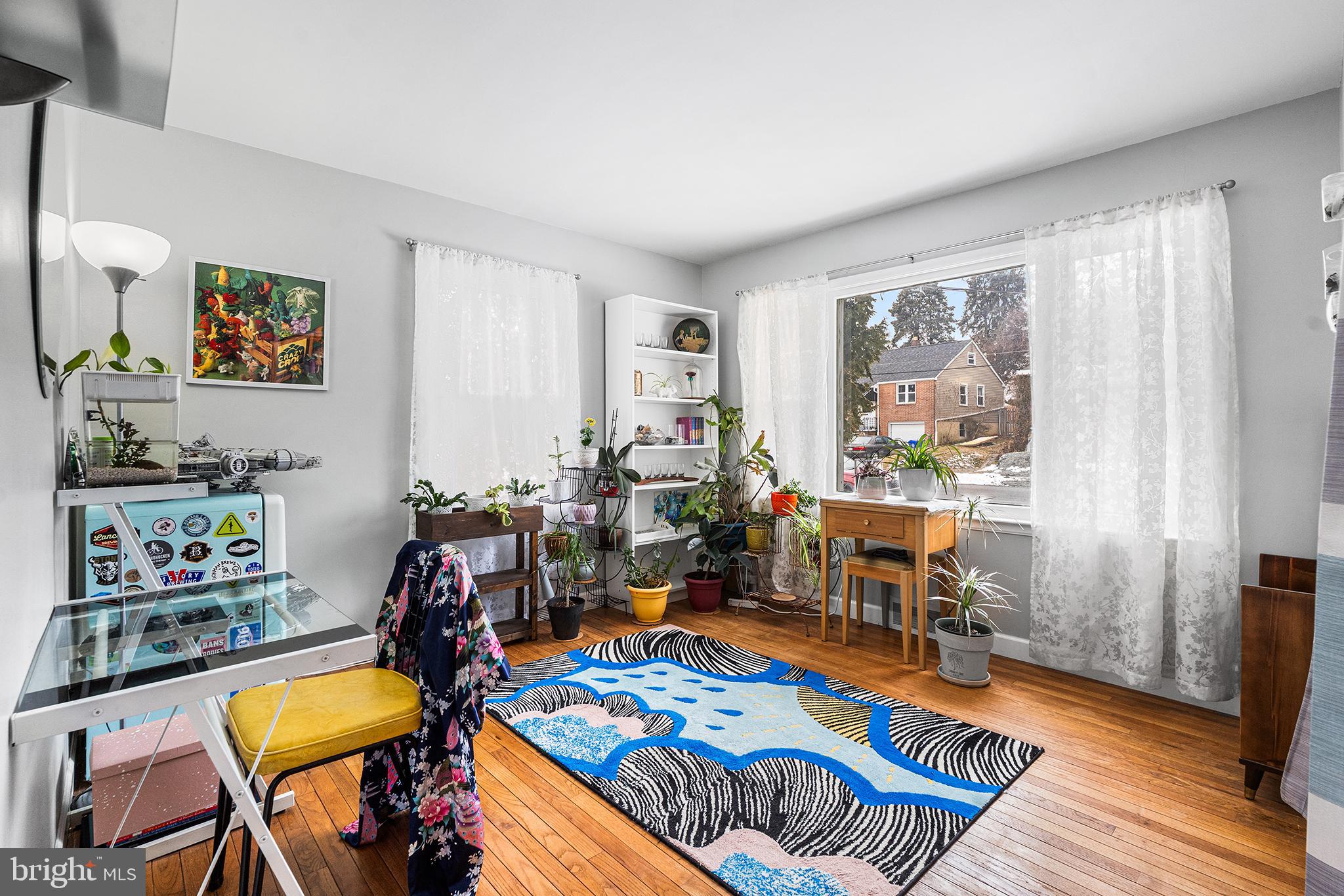 225 McClellan Street Reading, PA 19611 - Photo 9 of 25 a living room with furniture and a wooden floor
