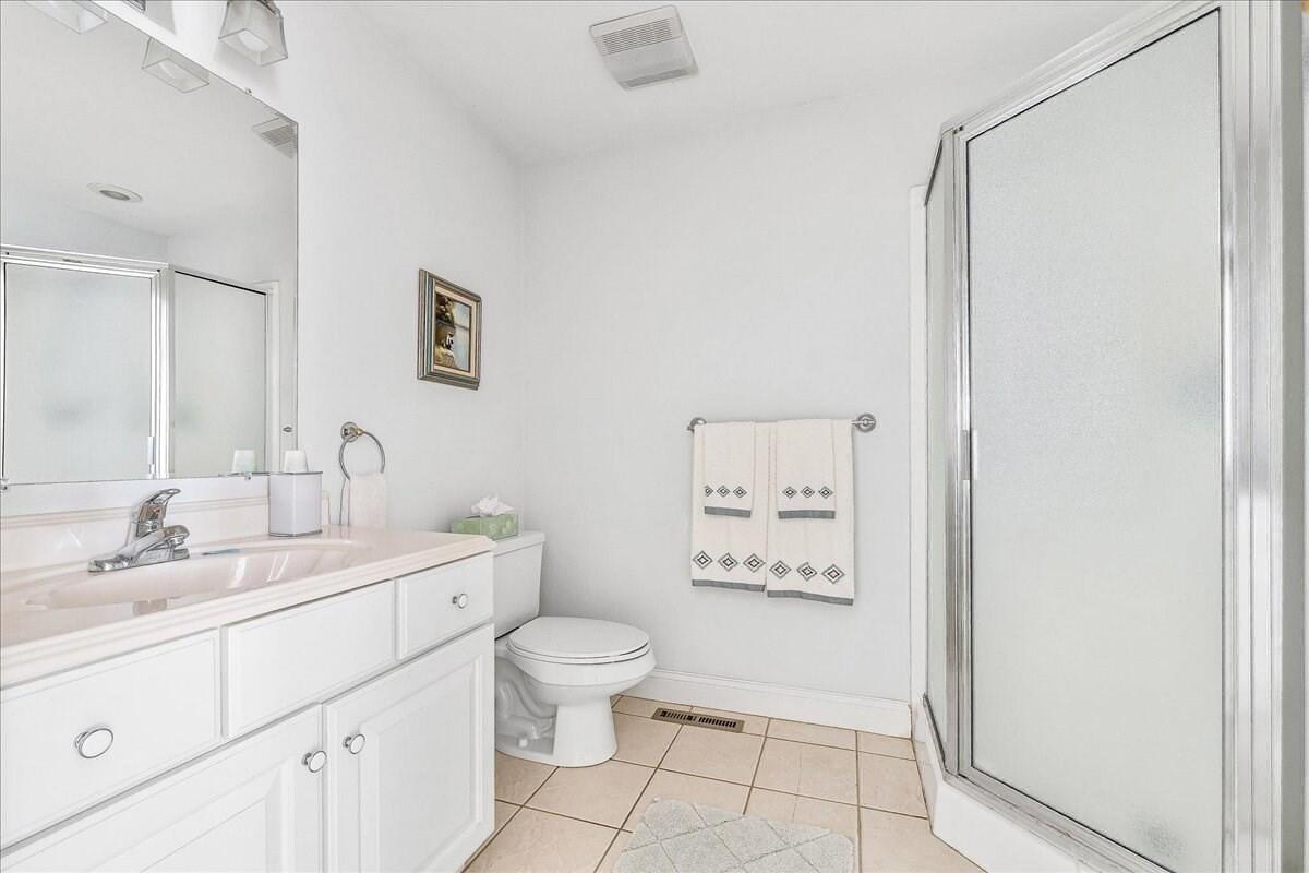 4 Old Field Road Plymouth, MA 02360 - Photo 22 of 42 a spacious bathroom with a toilet sink and mirror