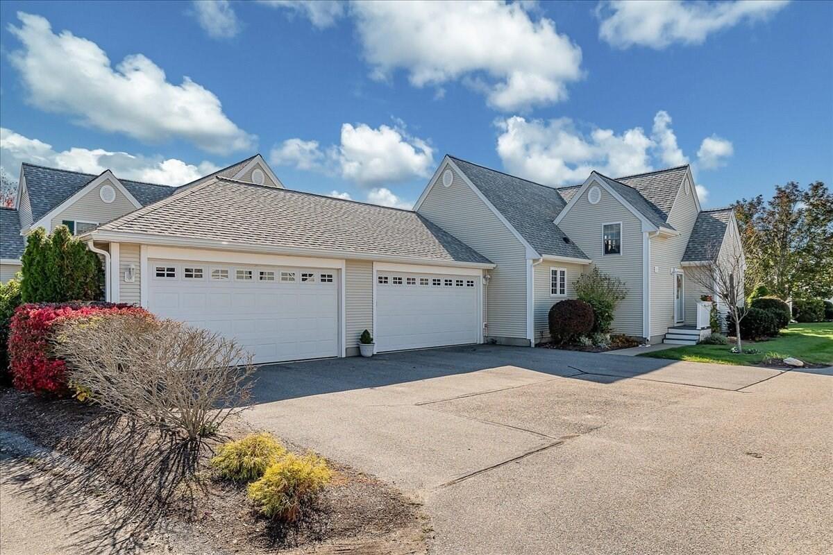 4 Old Field Road Plymouth, MA 02360 - Photo 3 of 42 a view of a house with a yard and a garage
