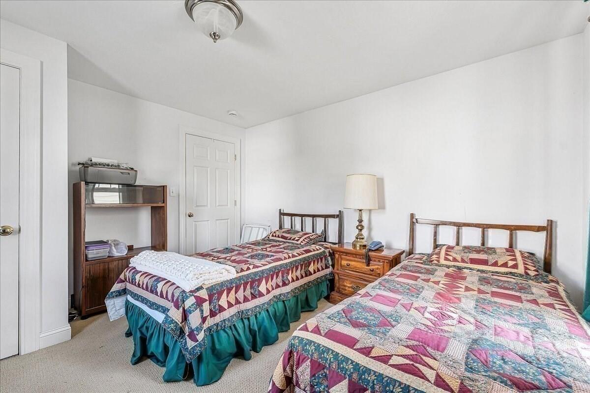 4 Old Field Road Plymouth, MA 02360 - Photo 32 of 42 a bedroom with two beds and painted walls