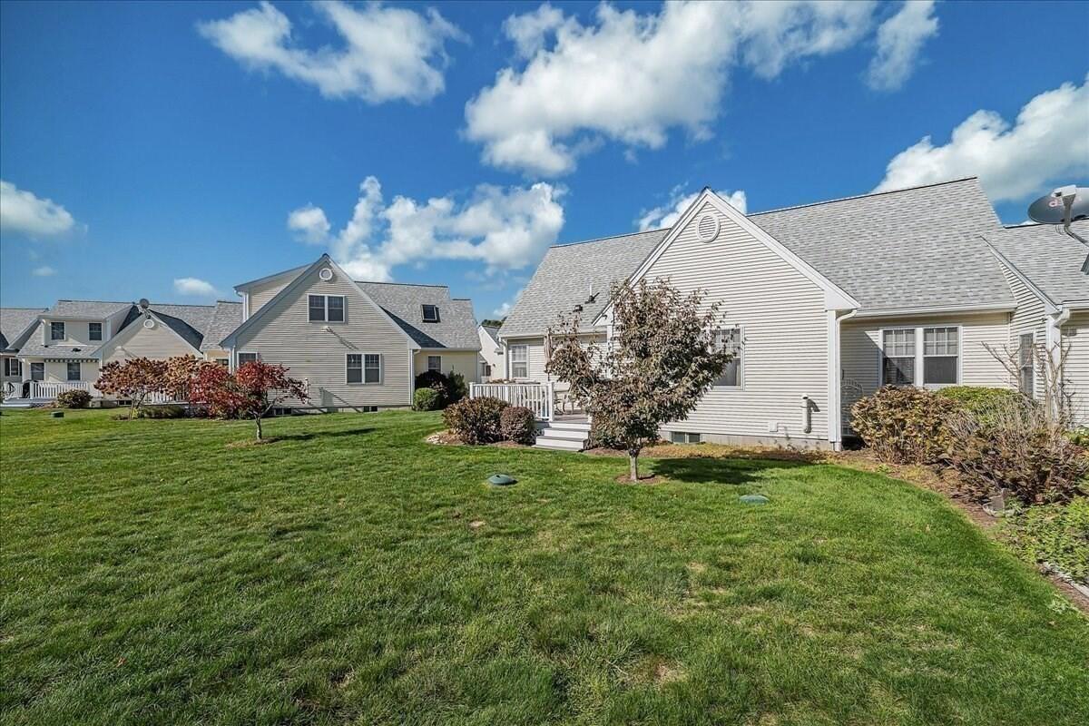 4 Old Field Road Plymouth, MA 02360 - Photo 37 of 42 a front view of a house with garden