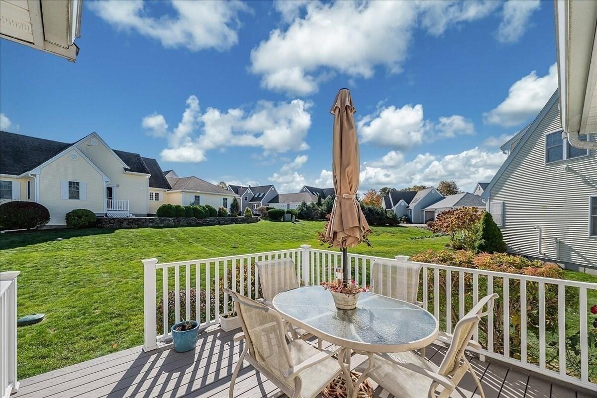4 Old Field Road Plymouth, MA 02360 - Photo 6 of 42 a view of a table and chairs on the roof deck