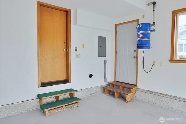 a room with gym equipment and a window