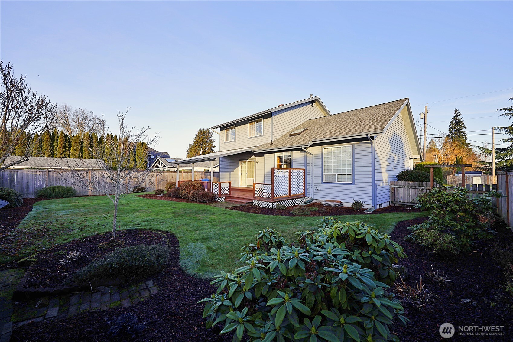 424 16th Street Southwest Puyallup, WA 98371 - Photo 34 of 39 a front view of a house with garden