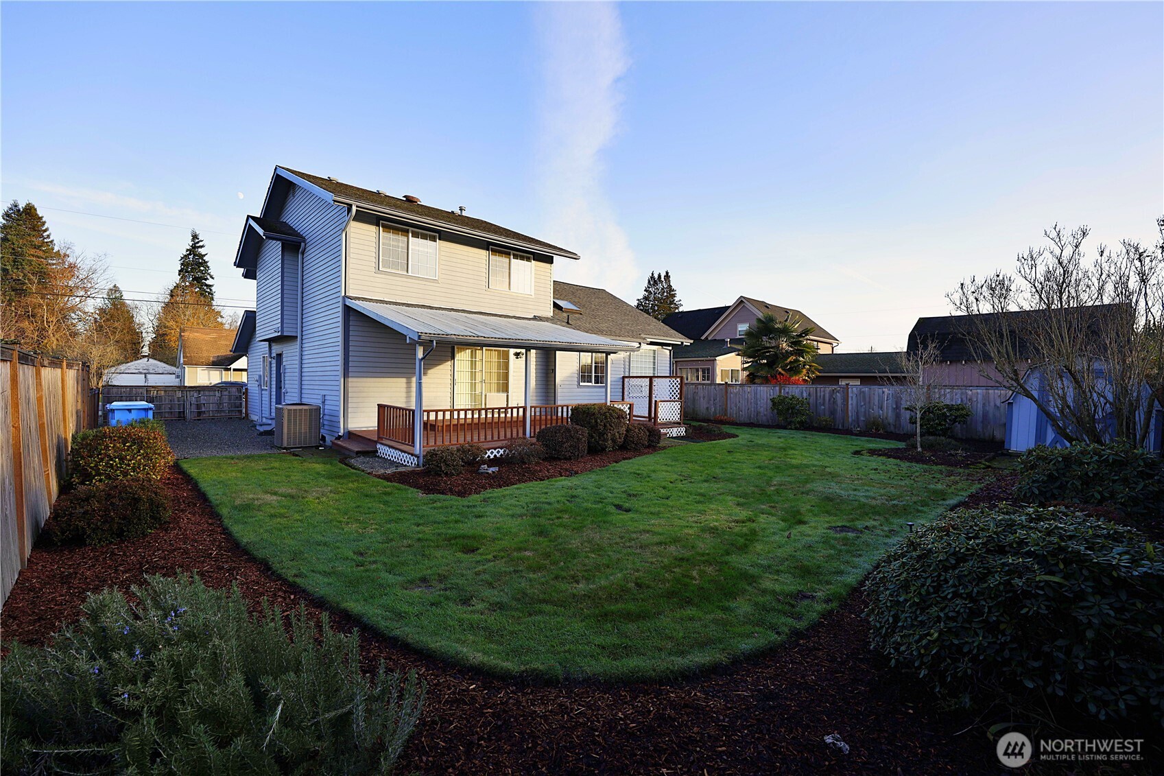 424 16th Street Southwest Puyallup, WA 98371 - Photo 36 of 39 a front view of a house with garden