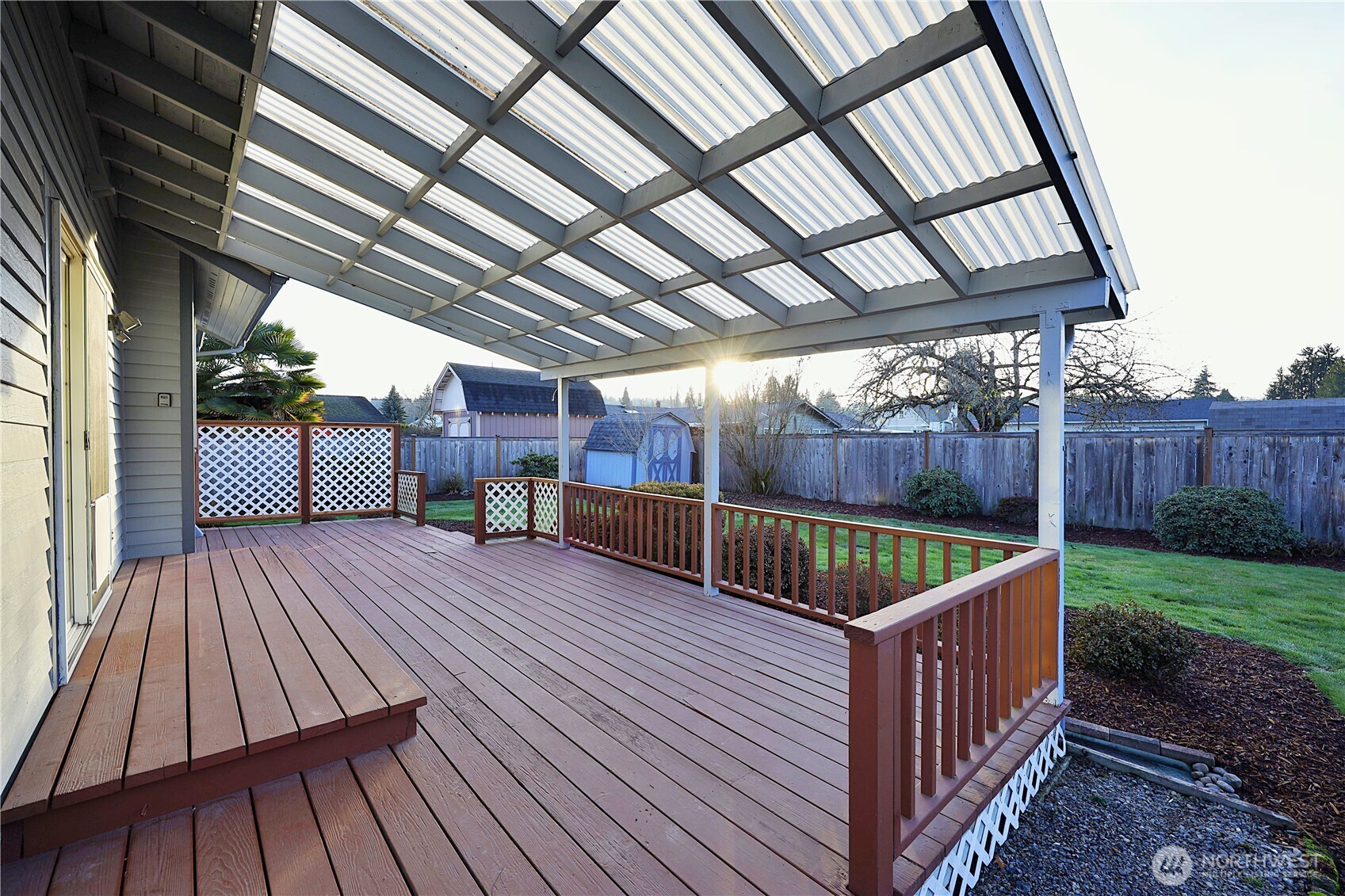 424 16th Street Southwest Puyallup, WA 98371 - Photo 37 of 39 a view of deck with wooden floor and fence
