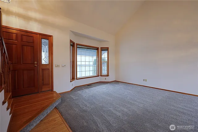 an empty room with windows