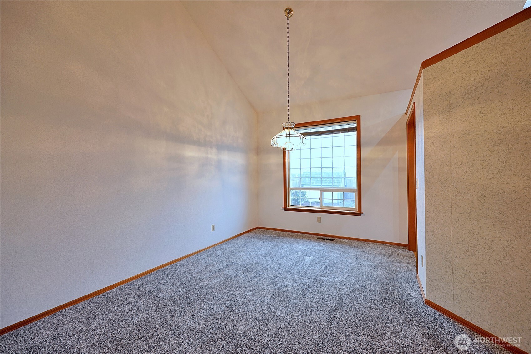 424 16th Street Southwest Puyallup, WA 98371 - Photo 5 of 39 a view of an empty room with a window