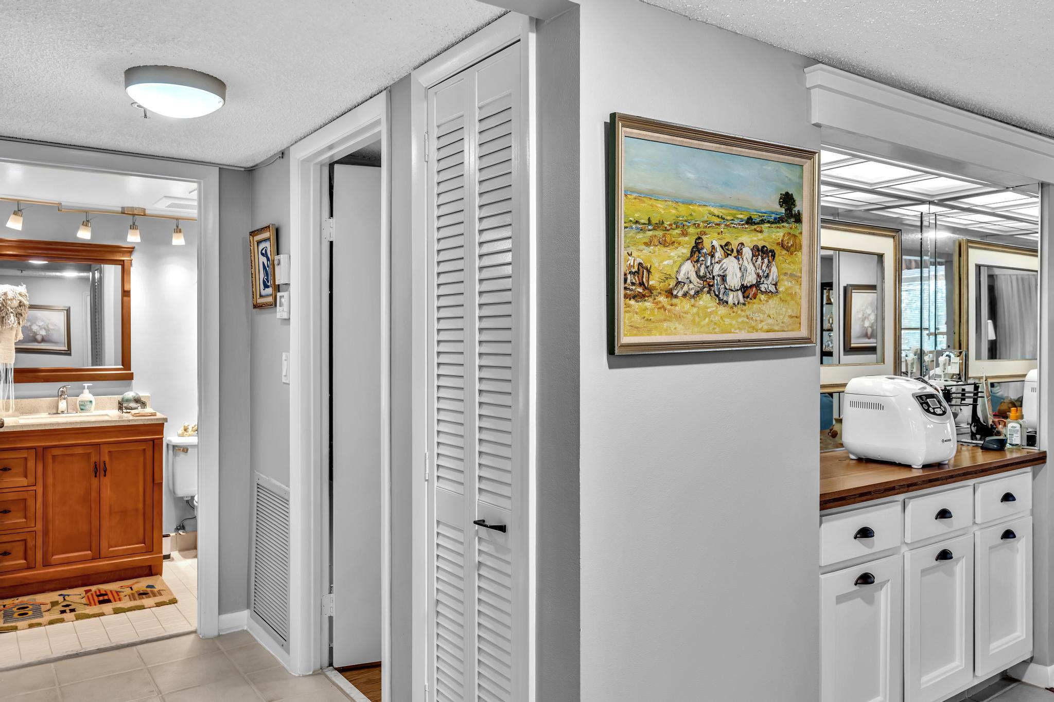 6320 Boca Del Mar Drive, Unit 303 Boca Raton, FL 33433 - Photo 11 of 42 a bathroom with a sink and a mirror