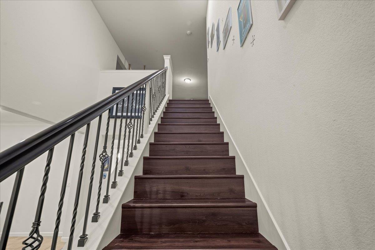 12791 Evanston Way Rancho Cordova, CA 95742 - Photo 15 of 54 Upgraded wrought iron staircase to upstairs.