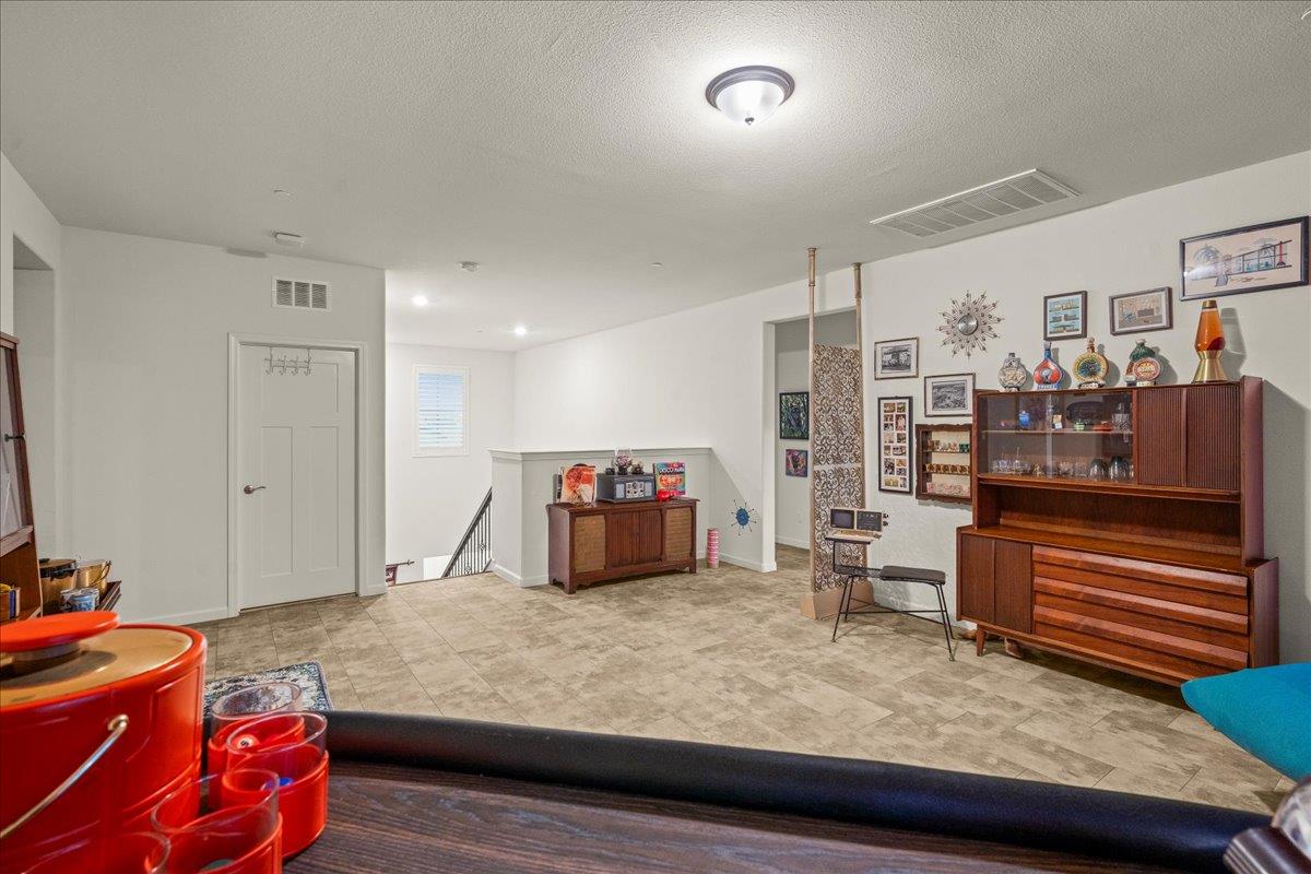 12791 Evanston Way Rancho Cordova, CA 95742 - Photo 19 of 54 a bedroom with furniture and wooden floor