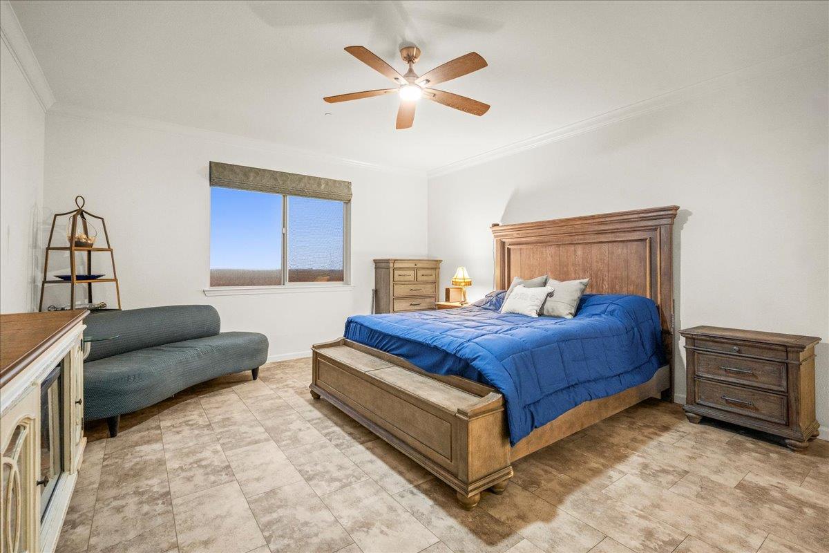 12791 Evanston Way Rancho Cordova, CA 95742 - Photo 21 of 54 a bedroom with a bed window and couch