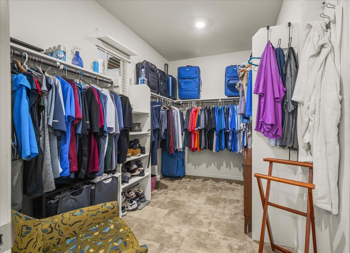 12791 Evanston Way Rancho Cordova, CA 95742 - Photo 24 of 54 a view of walk in closet with clothes